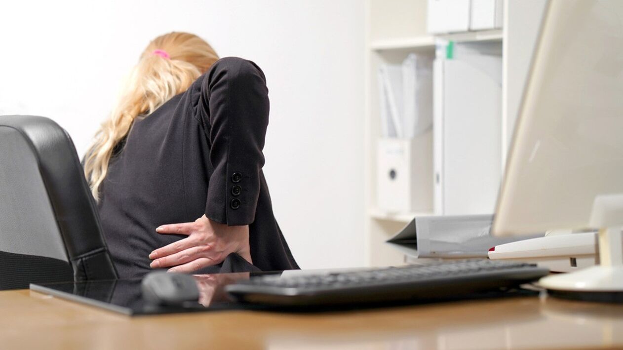 A woman is worried about pain in the lower back